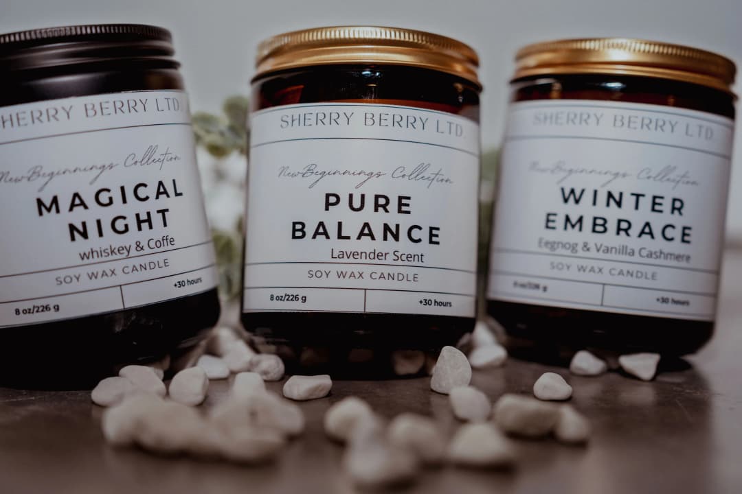 Candle glowing with a backdrop inspired by Canada